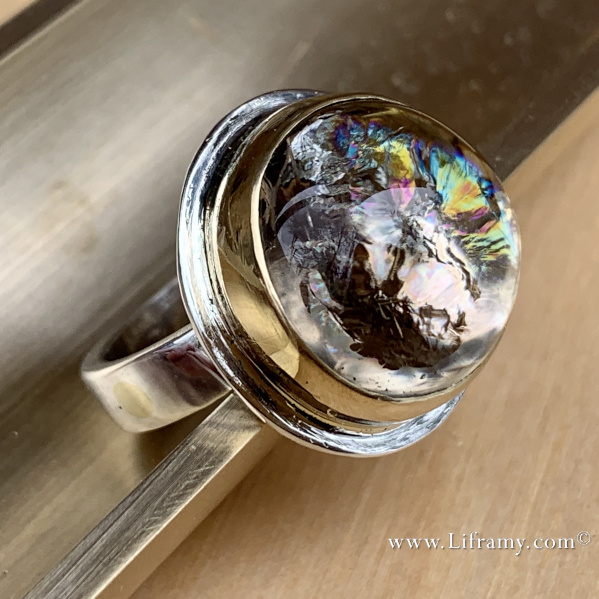 Shop Liframy - Rainbow Quartz 18k bezel sterling silver band ring One of a kind hand forged statement jewelry by Amy Whitten in the Rocky Mountains of the USA